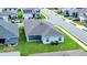 Aerial view showcasing the house's location, backyard, and surrounding neighborhood at 1274 Zambrana Ct, Winter Haven, FL 33884