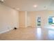 Spacious Gathering room with tile floors and access to backyard at 1274 Zambrana Ct, Winter Haven, FL 33884