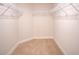 Spacious walk-in closet with wire shelving and hanging rods at 1274 Zambrana Ct, Winter Haven, FL 33884