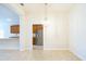 Dining room with view into kitchen and stainless steel appliances at 1274 Zambrana Ct, Winter Haven, FL 33884