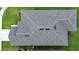 Aerial view of a house showcasing a gray asphalt shingle roof at 1274 Zambrana Ct, Winter Haven, FL 33884