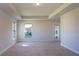 Main bedroom with carpeted floors and large windows at 1274 Zambrana Ct, Winter Haven, FL 33884