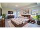 Relaxing main bedroom with a large bed and plenty of natural light at 1274 Zambrana Ct, Winter Haven, FL 33884