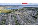 Property location view from above with nearby lake at 940 Waterville Dr, Auburndale, FL 33823