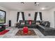 Relax in this home theater with sectional sofa and large screen at 940 Waterville Dr, Auburndale, FL 33823