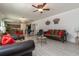 Open concept living room and kitchen with hardwood floors at 940 Waterville Dr, Auburndale, FL 33823