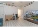 Bright game room with TV, games, and access to bathroom at 940 Waterville Dr, Auburndale, FL 33823