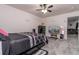 Spacious bedroom with a queen bed and access to living room at 940 Waterville Dr, Auburndale, FL 33823