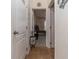 Clean hallway with access to bedrooms and bath at 940 Waterville Dr, Auburndale, FL 33823