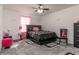 Charming bedroom with a queen-size bed and plenty of space at 940 Waterville Dr, Auburndale, FL 33823