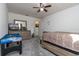 Comfortable bedroom with a king-size bed and game table at 940 Waterville Dr, Auburndale, FL 33823