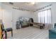 Game room featuring a large TV, game table, and comfortable seating at 940 Waterville Dr, Auburndale, FL 33823