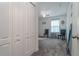 Spacious bedroom with double closets and two chairs at 940 Waterville Dr, Auburndale, FL 33823