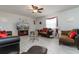 Living room with comfortable seating and a view to kitchen at 940 Waterville Dr, Auburndale, FL 33823