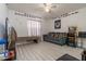 Fun game room with Pac-Personal game and seating at 940 Waterville Dr, Auburndale, FL 33823