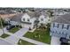 Two-story house, two-car garage, and nicely landscaped yard at 940 Waterville Dr, Auburndale, FL 33823