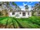 Modern house exterior, featuring a large backyard at 1211 Hollywood Ln, Lakeland, FL 33809