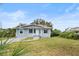Newly painted house with a well-maintained lawn at 1800 4Th Nw St, Winter Haven, FL 33881