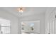 Bright dining room with hardwood floors and ceiling fan at 1800 4Th Nw St, Winter Haven, FL 33881