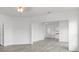 Open concept living room and kitchen with gray floors at 1800 4Th Nw St, Winter Haven, FL 33881