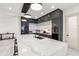 Modern kitchen with a large island and high-end appliances at 193 Stargrass Dr, Auburndale, FL 33823