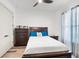 Cozy bedroom with ceiling fan and ample closet space at 193 Stargrass Dr, Auburndale, FL 33823