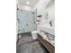 Contemporary bathroom with double vanity and marble shower at 193 Stargrass Dr, Auburndale, FL 33823