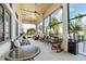 Relaxing community patio with screened-in seating area at 193 Stargrass Dr, Auburndale, FL 33823