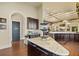 Well-equipped community kitchen with granite countertops at 193 Stargrass Dr, Auburndale, FL 33823