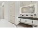 Elegant bathroom with double vanity, large mirror, and sleek design at 193 Stargrass Dr, Auburndale, FL 33823