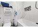 Simple bathroom with shower/tub combo and marble accents at 193 Stargrass Dr, Auburndale, FL 33823