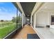 Relaxing screened patio featuring a fireplace and comfortable seating at 193 Stargrass Dr, Auburndale, FL 33823