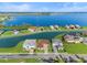 Aerial view of house near lake at 193 Stargrass Dr, Auburndale, FL 33823