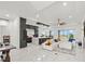 Open-concept kitchen features modern cabinetry, large island, and views at 193 Stargrass Dr, Auburndale, FL 33823