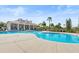 Relaxing kidney-shaped pool with surrounding lounge chairs at 193 Stargrass Dr, Auburndale, FL 33823