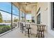 Community bar with seating overlooking the pool at 193 Stargrass Dr, Auburndale, FL 33823