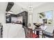Kitchen features modern cabinetry, breakfast bar, and view at 193 Stargrass Dr, Auburndale, FL 33823
