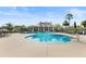 Resort-style community pool with a clubhouse in the background at 193 Stargrass Dr, Auburndale, FL 33823