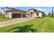 Luxury home with two-car garage and landscaping at 193 Stargrass Dr, Auburndale, FL 33823