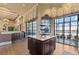 Community kitchen with island and view of pool at 193 Stargrass Dr, Auburndale, FL 33823
