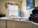 Bathroom with walk in tub and window at 1937 Rifle Range Rd, Winter Haven, FL 33880