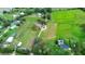 Aerial view of the property and surrounding farmlands at 1937 Rifle Range Rd, Winter Haven, FL 33880
