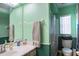 Clean bathroom with a shower/tub combination and updated vanity at 1937 Rifle Range Rd, Winter Haven, FL 33880