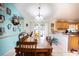 Bright dining room with a glass-top table and seating for six at 1937 Rifle Range Rd, Winter Haven, FL 33880