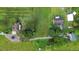 Aerial view of two houses on a property with lush green surroundings at 1957 Rifle Range Rd, Winter Haven, FL 33880