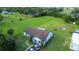 Property with a house and large grassy yard at 1957 Rifle Range Rd, Winter Haven, FL 33880