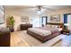Spacious main bedroom with large bed and wood dresser at 1957 Rifle Range Rd, Winter Haven, FL 33880