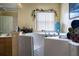 Bathroom features a walk-in tub and double vanity at 1957 Rifle Range Rd, Winter Haven, FL 33880