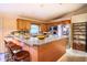 Spacious kitchen with a large island and wooden cabinets at 1957 Rifle Range Rd, Winter Haven, FL 33880
