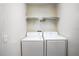 Small laundry room with washer and dryer at 1957 Rifle Range Rd, Winter Haven, FL 33880